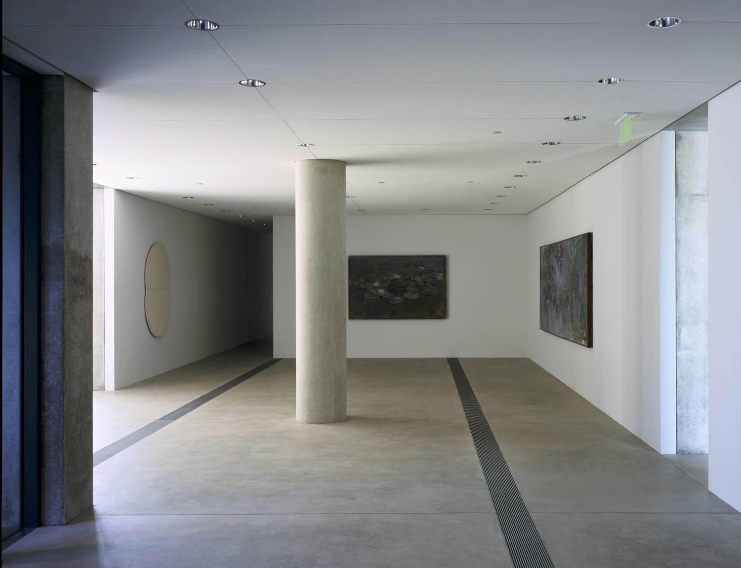 A view of the entrance gallery which includes a Monet Water Lilies painting.
