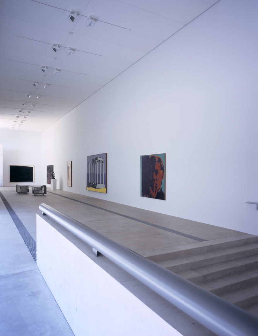 A view of the exhibition in the Main Gallery from the walkway to the Cube Gallery.