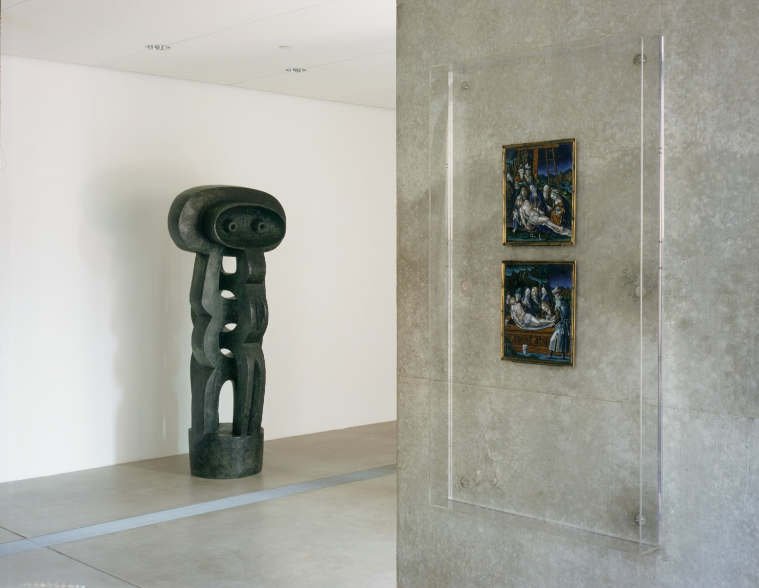 A view of Lipchitz's towering black "Figure," which stares at the entrance doors, and Pierre Reymond's "The Deposition of Christ and The Entombment of Christ," encased in glass on the wall, in the Entrance Gallery.
