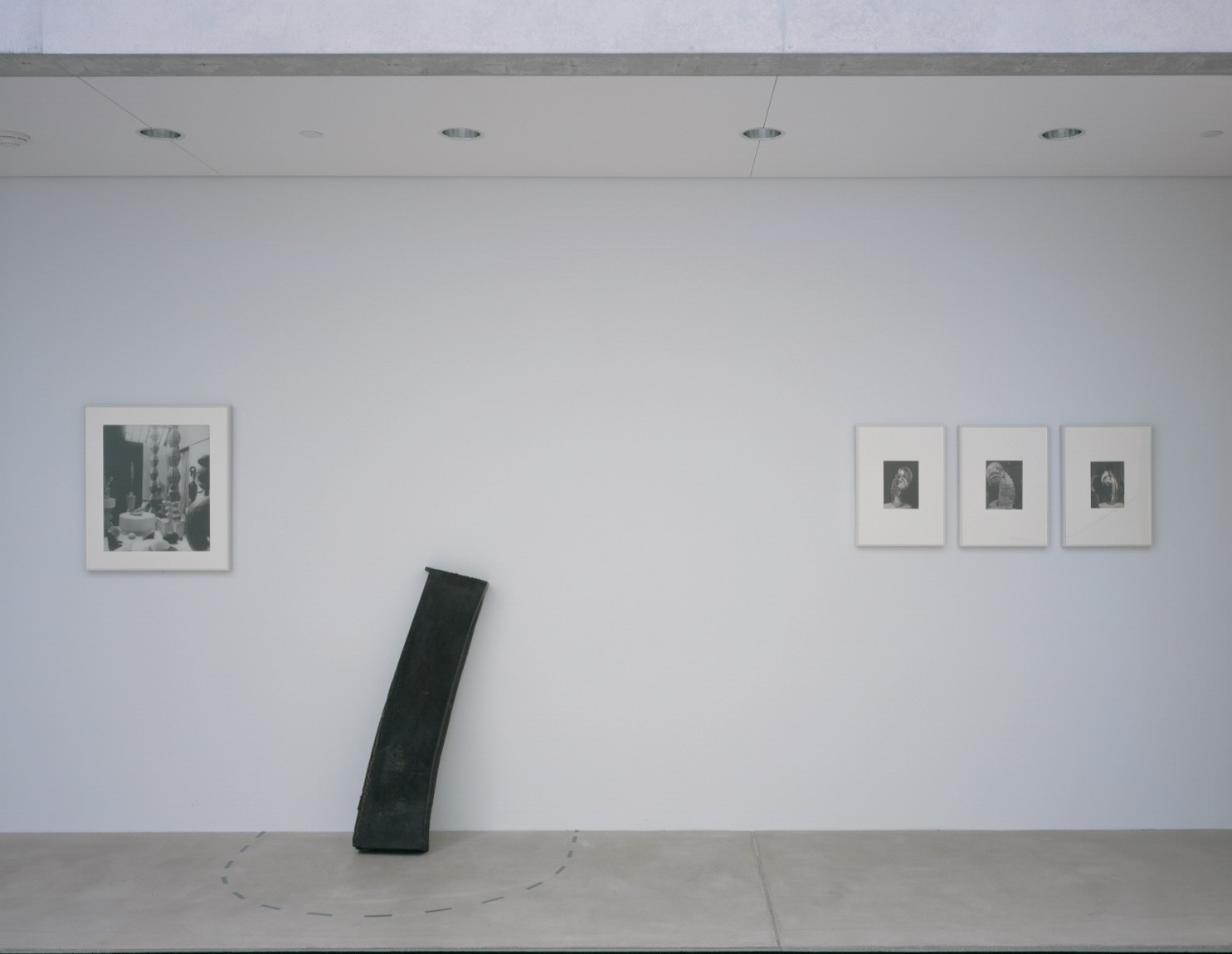 In the Lower Gallery: Brâncuși's silver print "The Studio," Serra's "Chunk," and three Brâncuși silver prints of different marble versions of "Mademoiselle Pogany II."