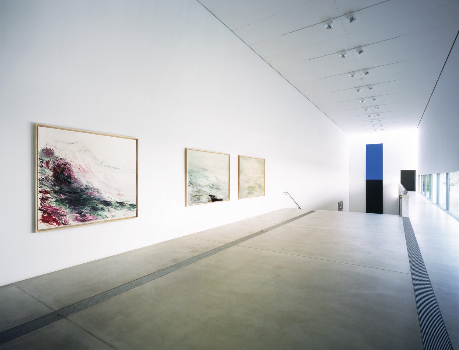 A view of the Main Gallery with three large Cy Twombly pieces titled "Hero and Leandro" on the east wall.