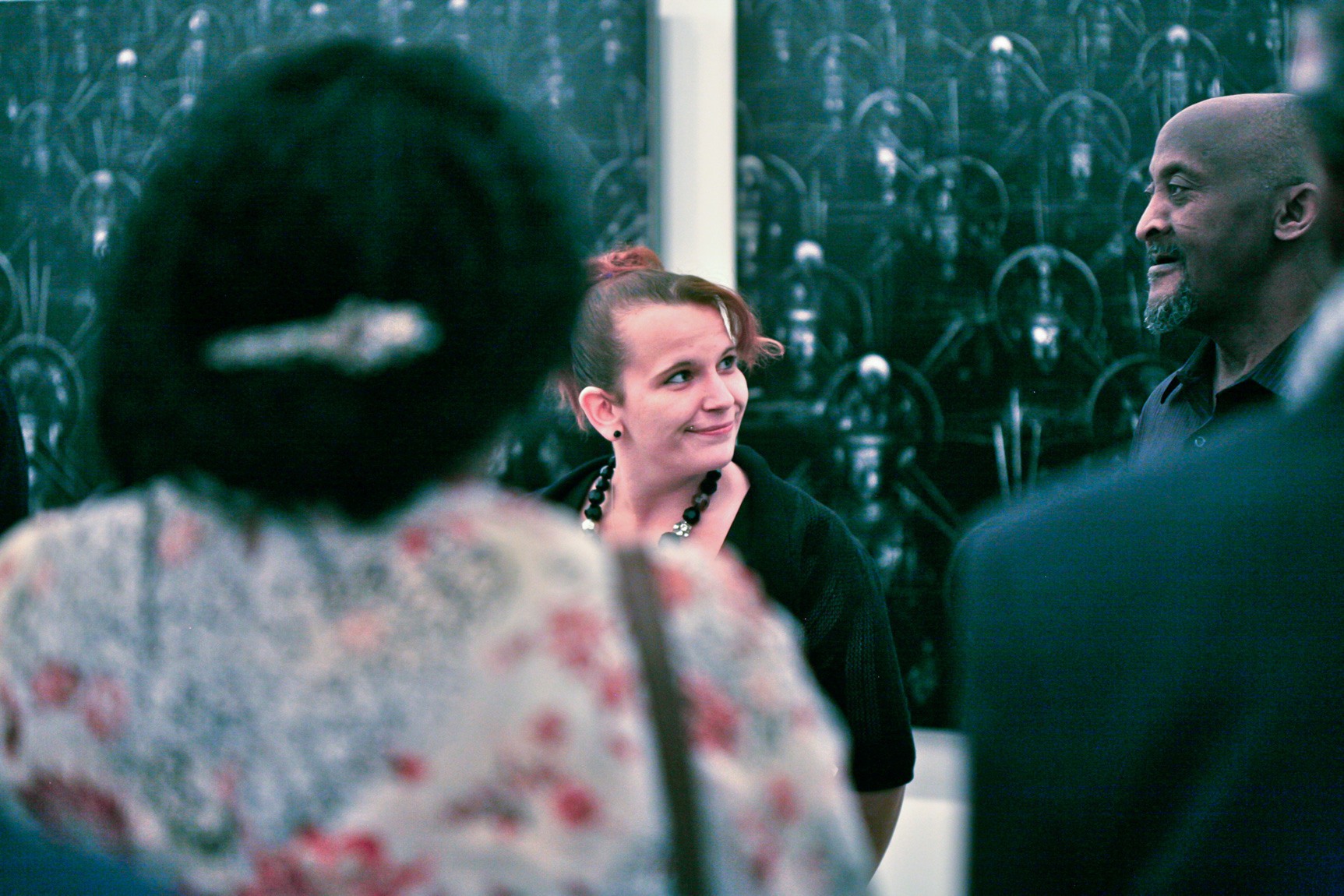 A guest smiles at one another during the event.