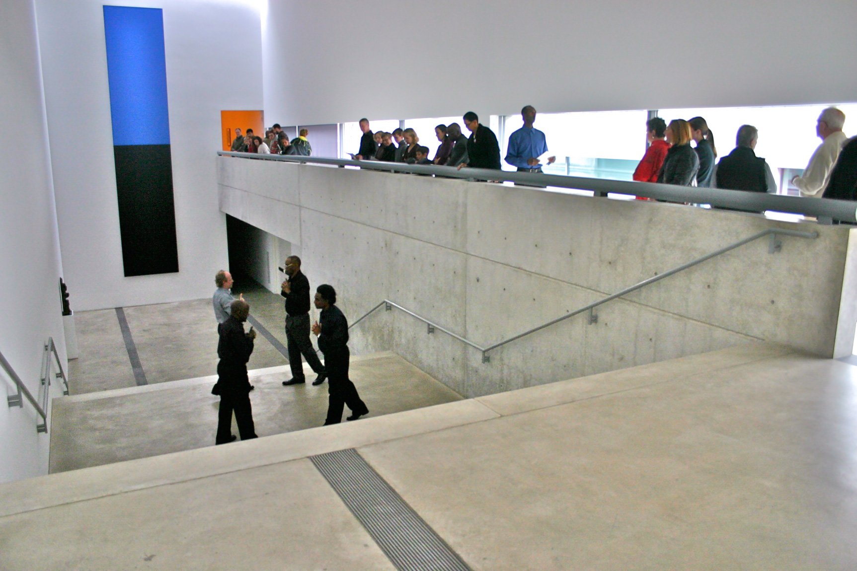 Participants perform on the Main Staircase for guests, who watch from railing above.