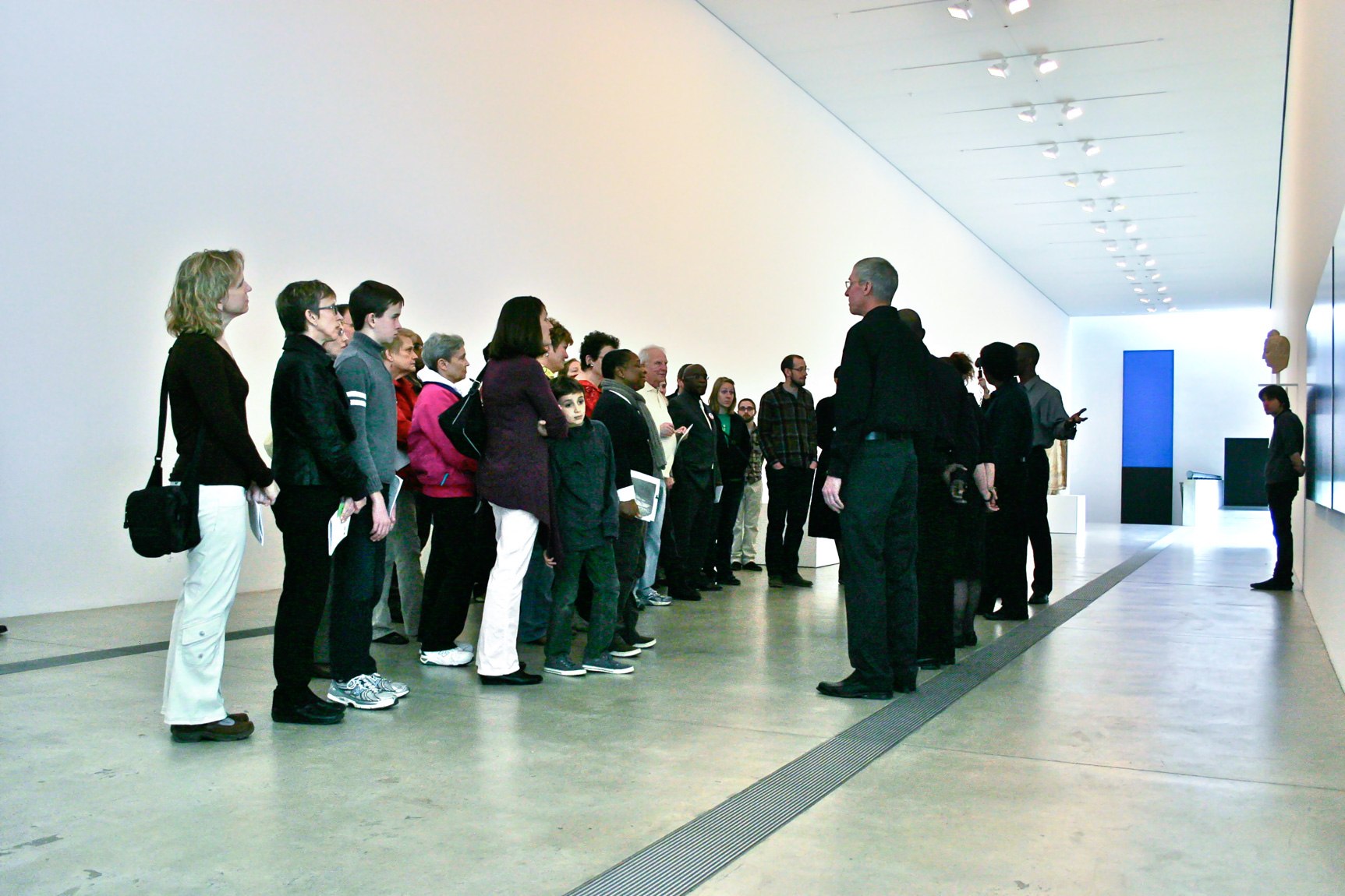 Guests listen to the participants' experiences in the Main Gallery.