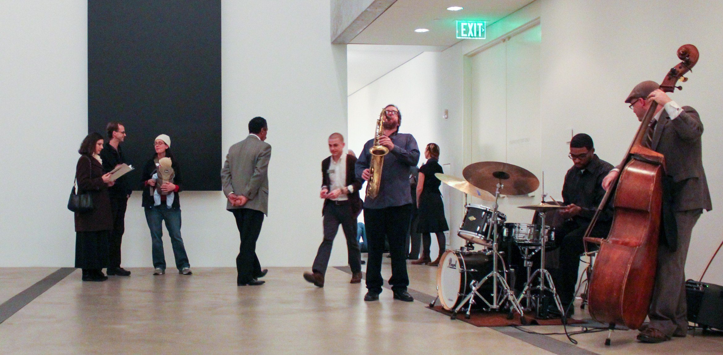 Jazz trio performs in the Lower-Main Gallery while guests visit.