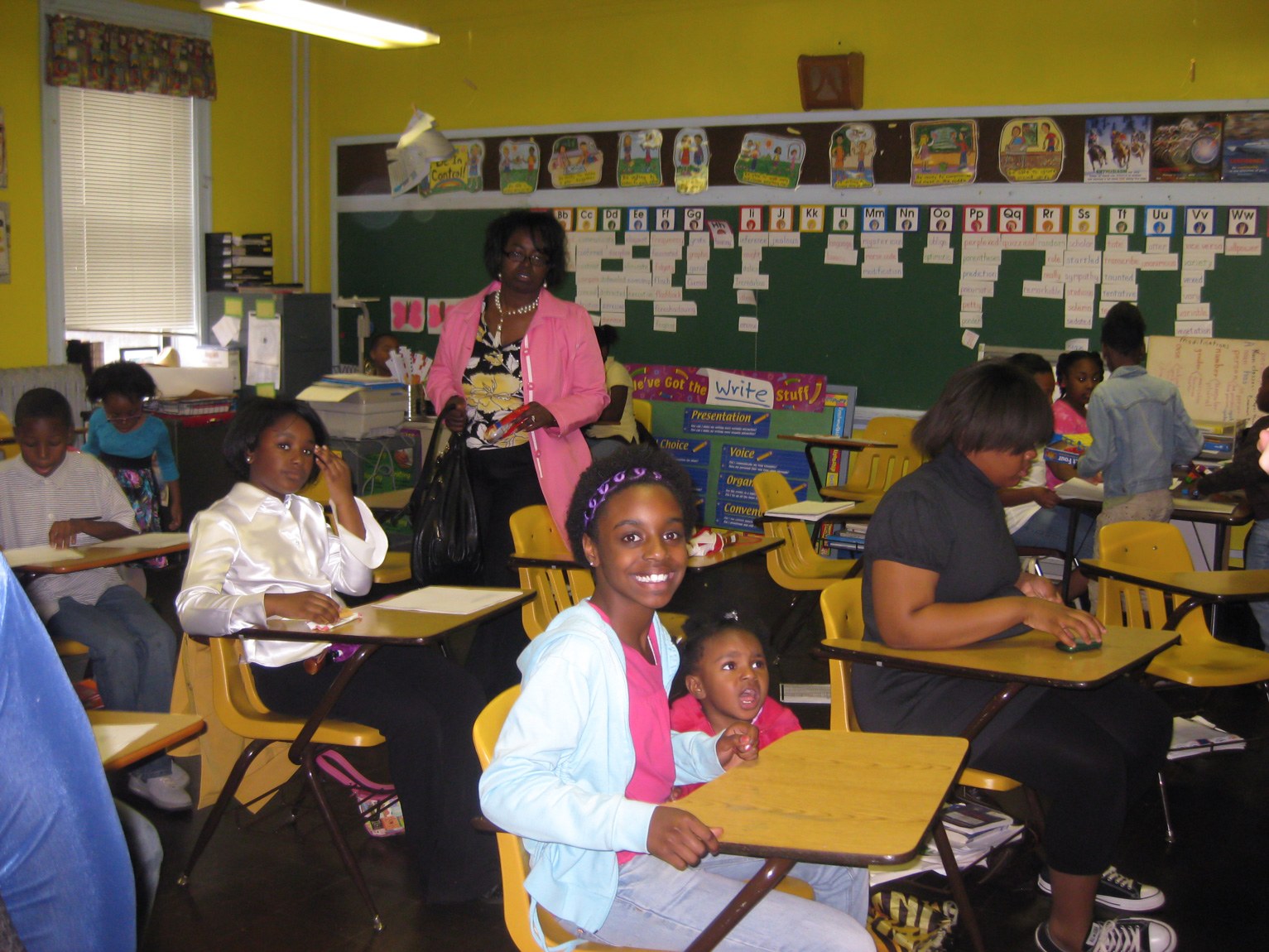 A classroom of students sitting at desks.