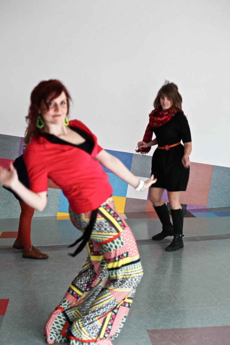 A few visitors dance in the Main Gallery.