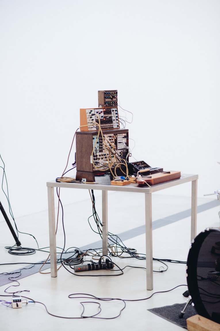 A view of Sun Bros' homemade synthesizer sitting on a table.