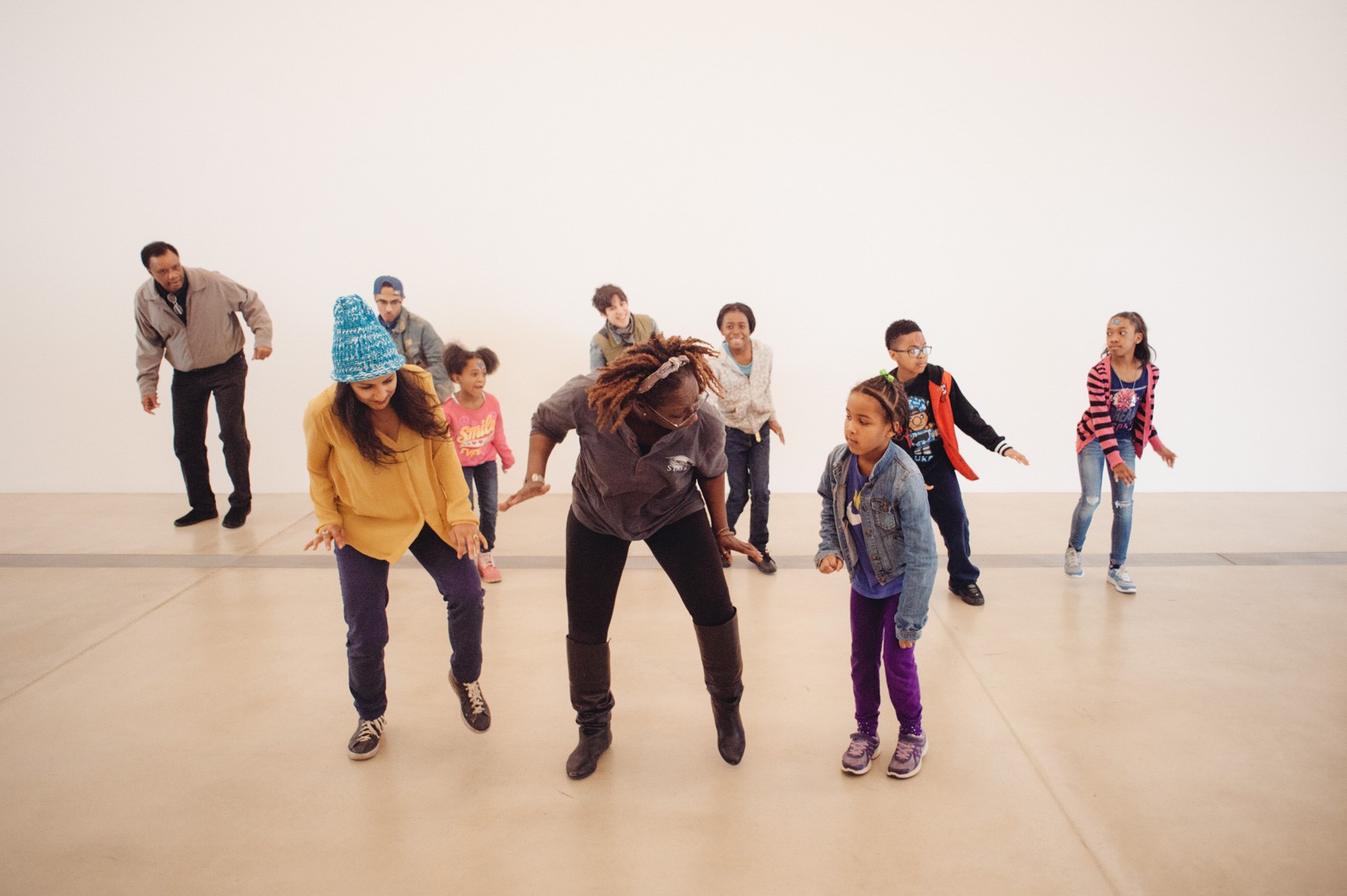 Visitors take a dance lesson in the Main Gallery.