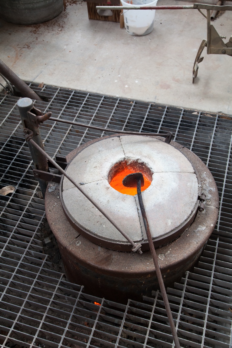 A view of the forge holding molten metal.