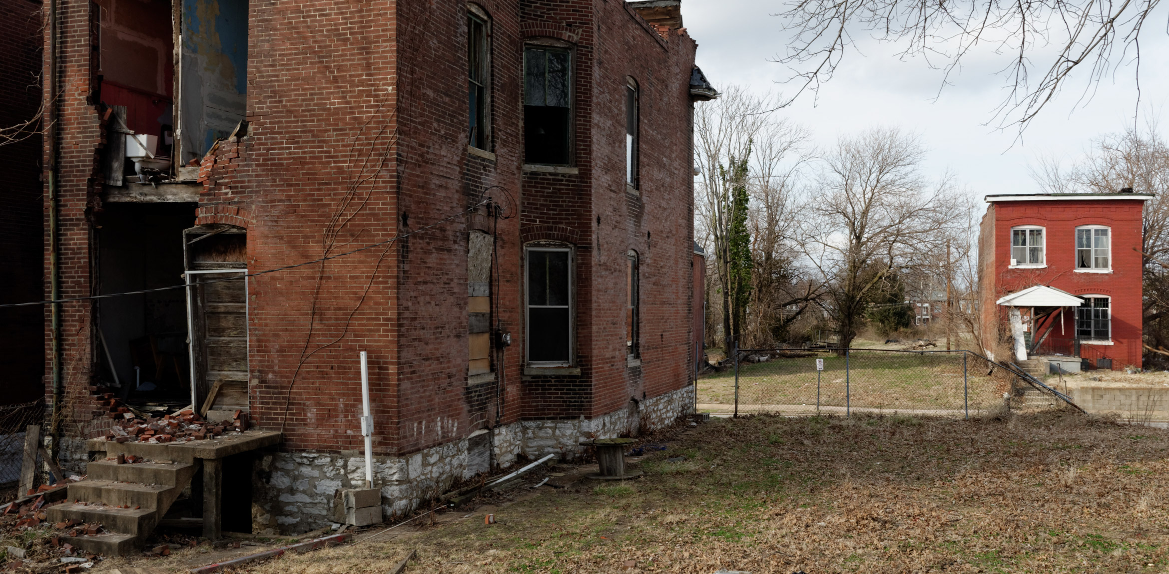 A rear view of the gutted out 4562 Enright Avenue, a brick townhouse in a St. Louis neighborhood.