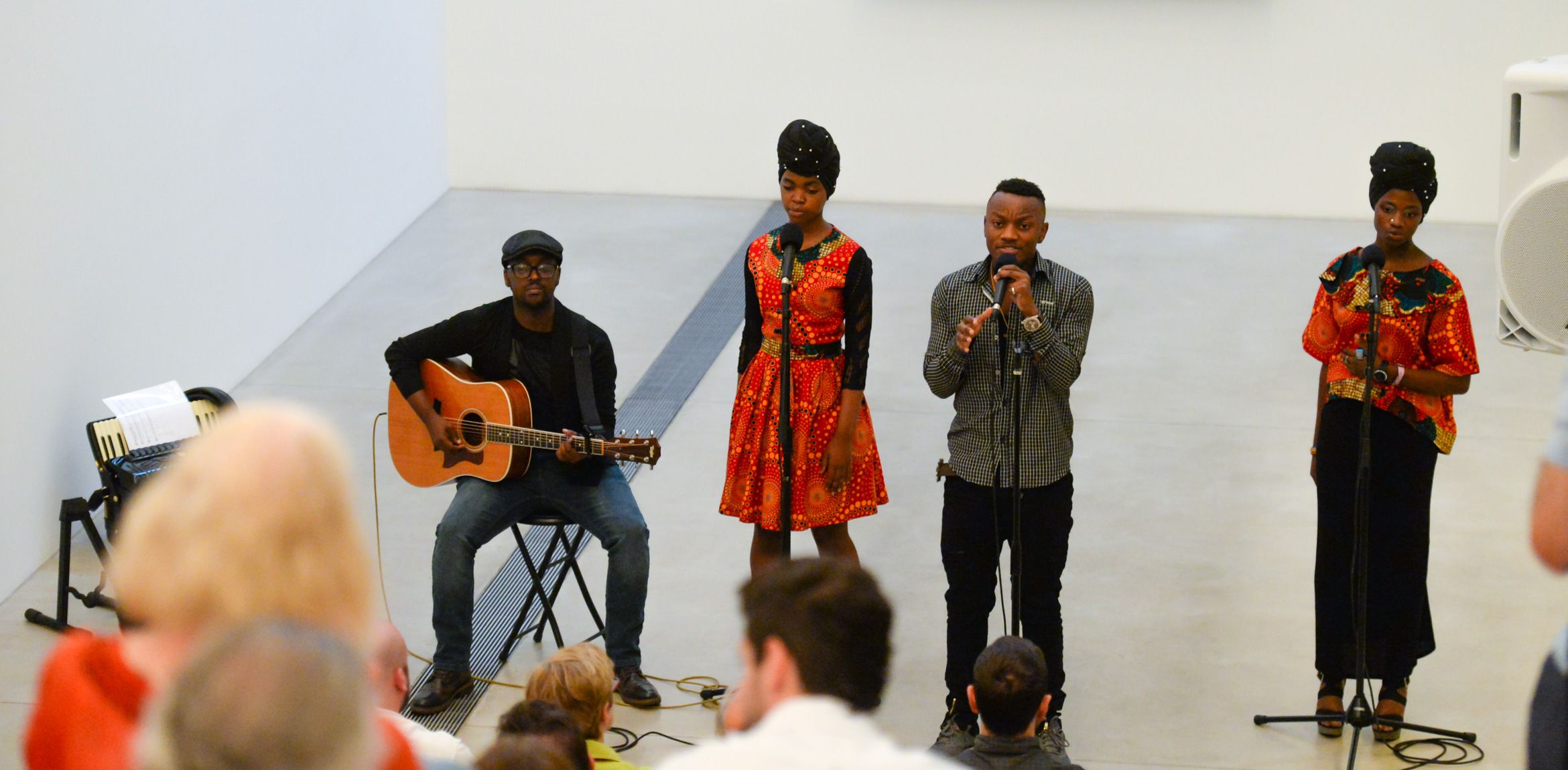 Wise Forever performs in the Lower Main Gallery for an audience on the Main Staircase.