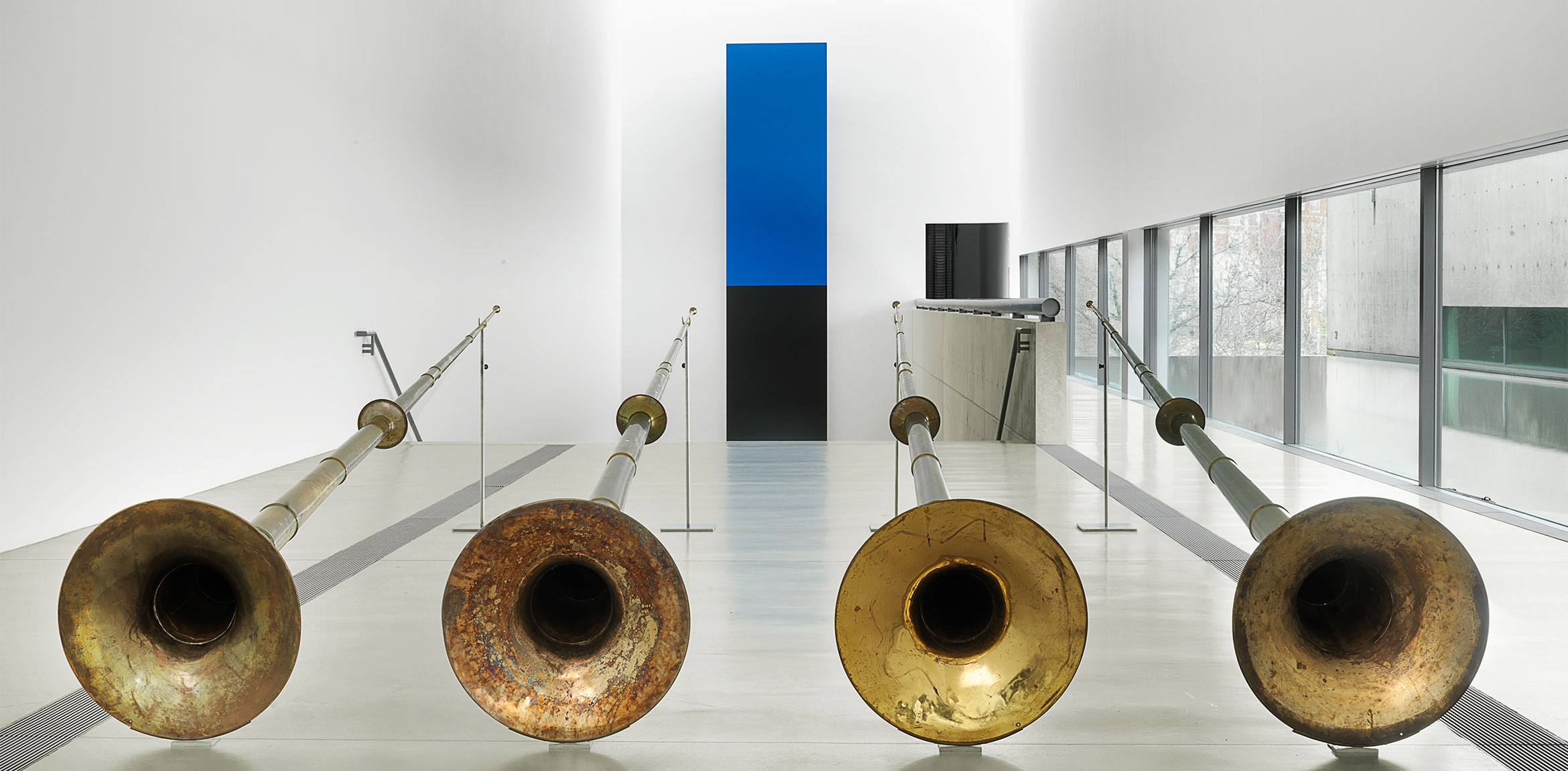Terry Adkins' "Last Trumpet" in the Main Gallery, four 18-foot akrhaphones designed by the artist.