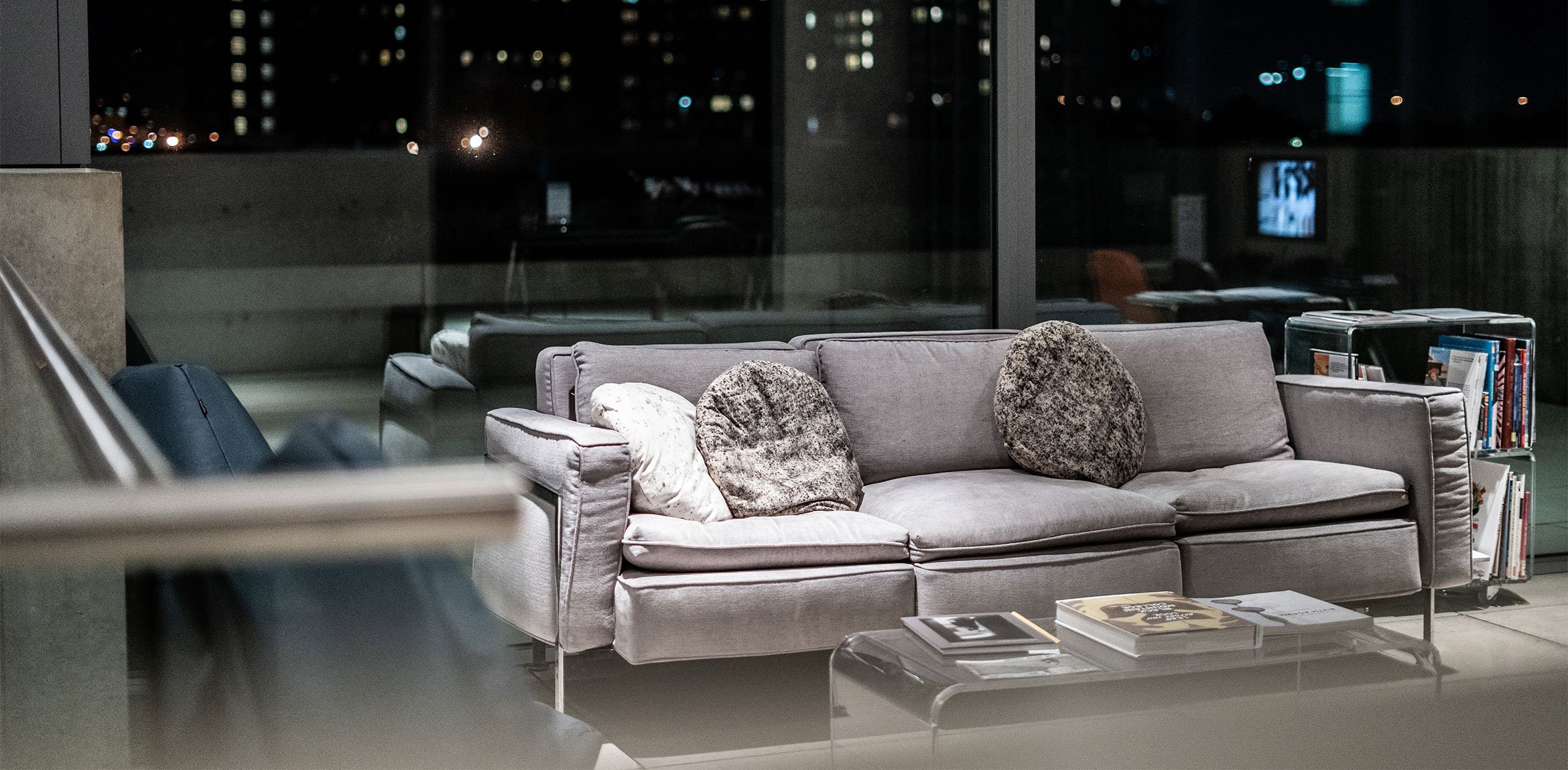 A couch in the Mezzanine at night.