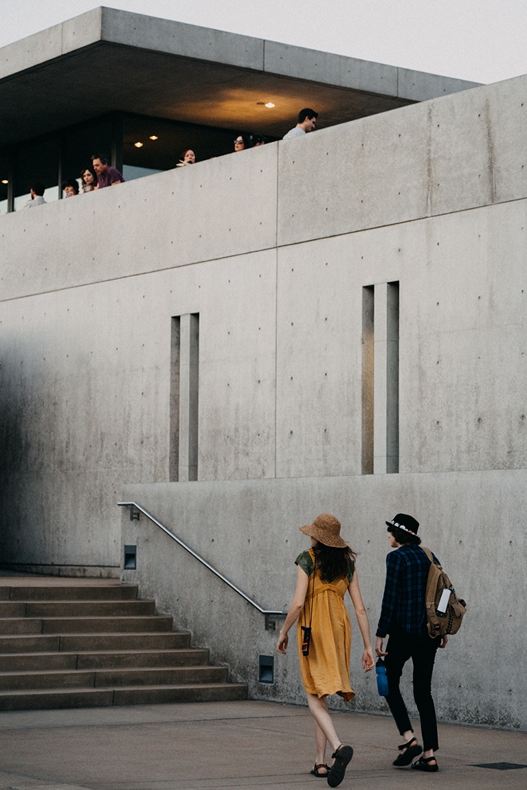 People entering the Pulitzer Arts Foundation from the courtyard