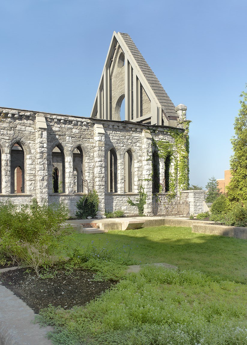Exterior of the Spring Church, an open-air stone pavillion for community gathering and public art.