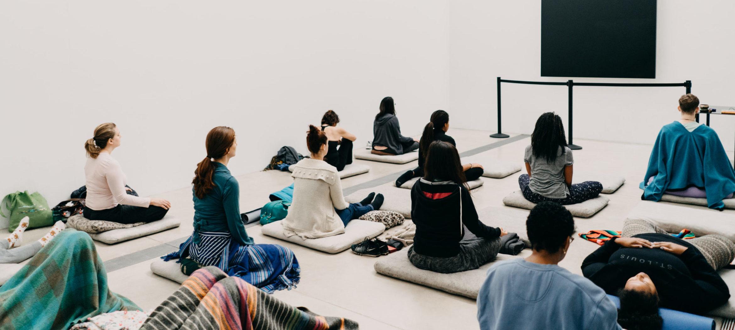 People participating in sound healing meditation at the Pulitzer Arts Foundation
