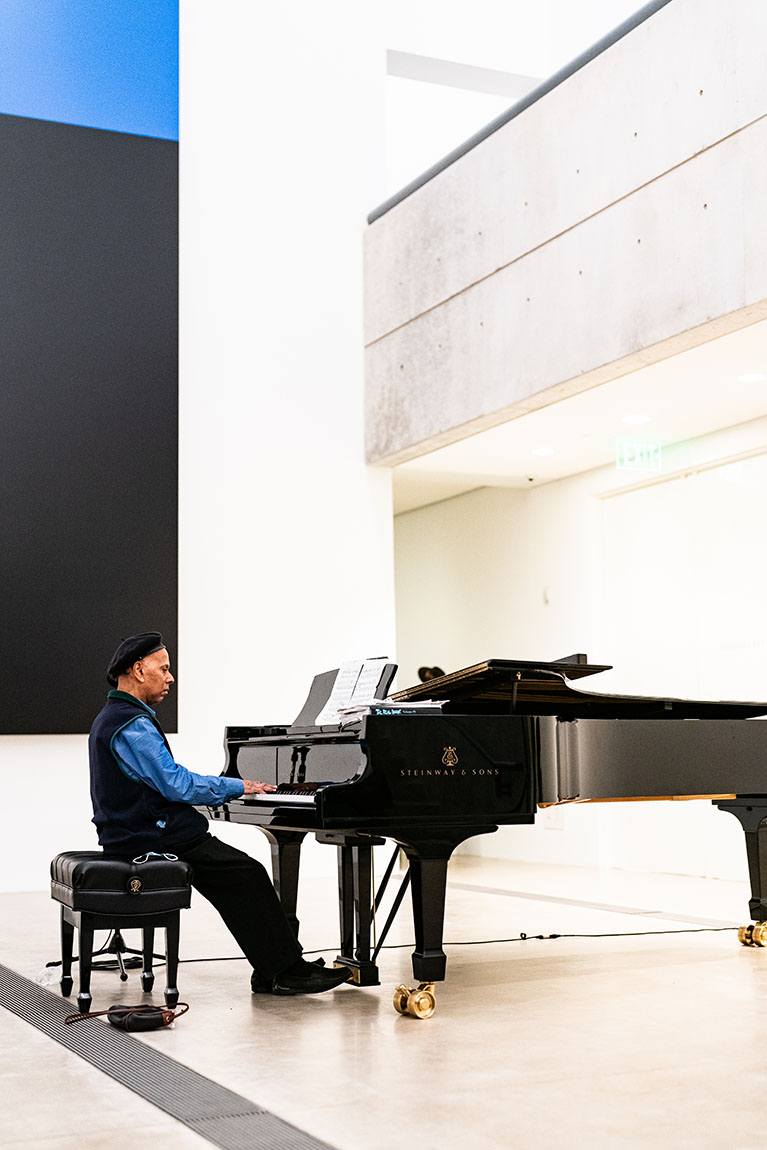 Jazz pianist Ptah Williams performing during the closing reception of "Barbara Chase-Riboud" Monumentale: "The Bronzes."
