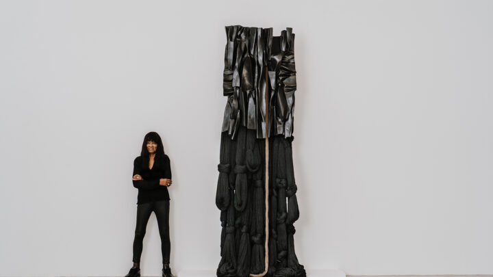 Barbara Chase-Riboud in front of her one of her sculpture, 