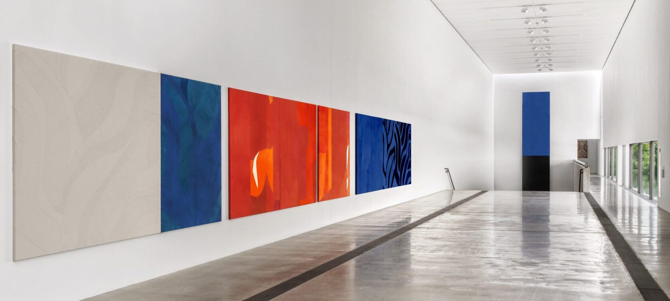 Installation view of Sarah Crowner paintings and Ellsworth Kelly's "Blue Black" painting.