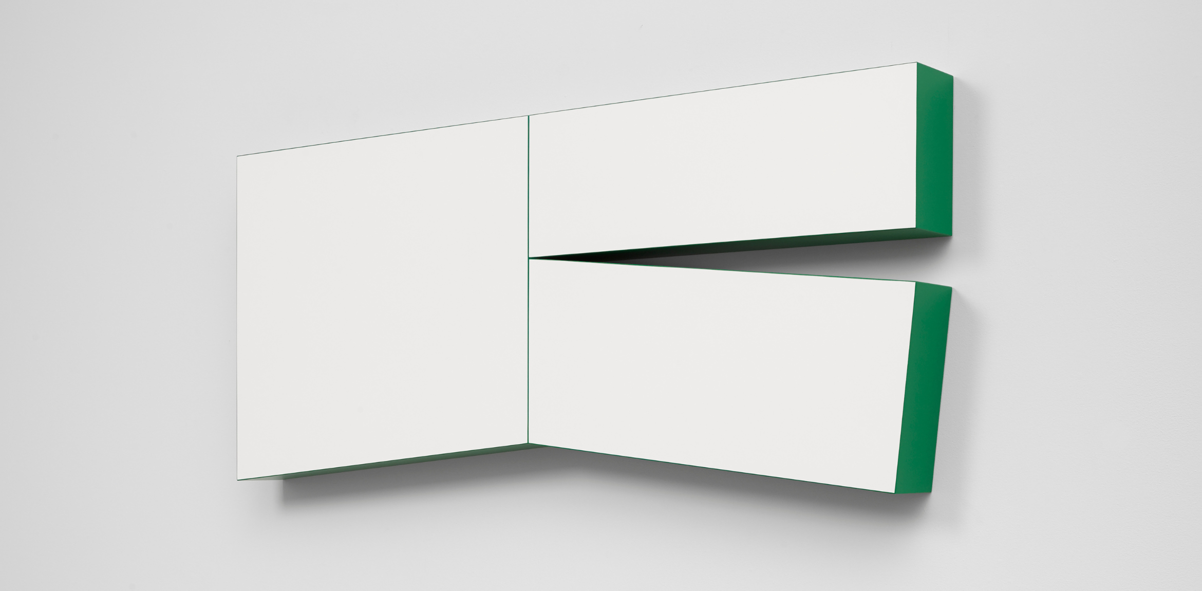 White and green painting and sculpture by Carmen Herrera.
