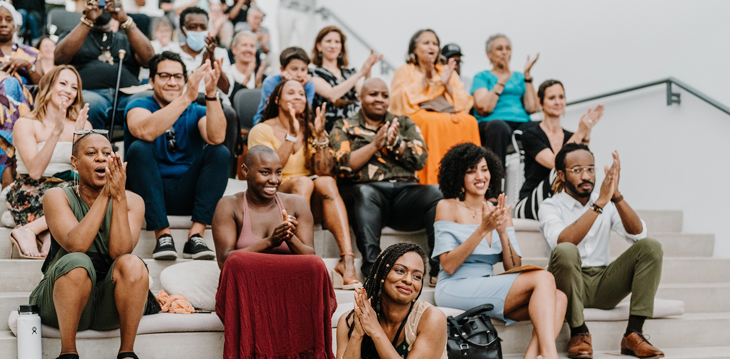 Visitors watch the performance from the Main Staircase.